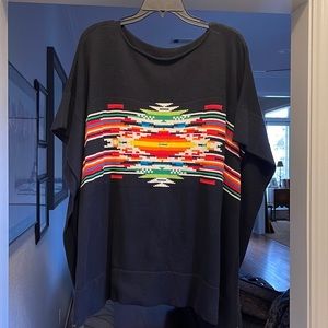 Black poncho with colorful southwest design